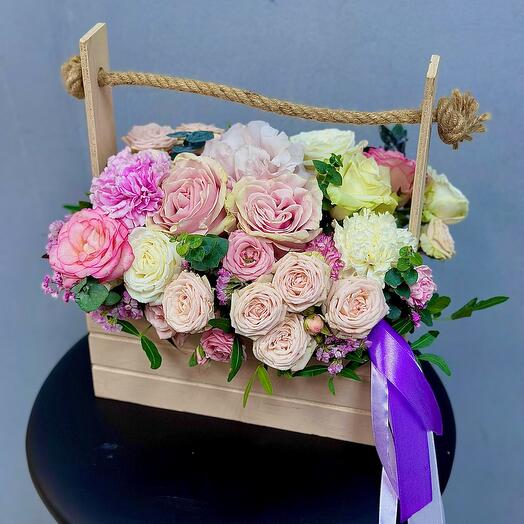 Composition in a wooden box