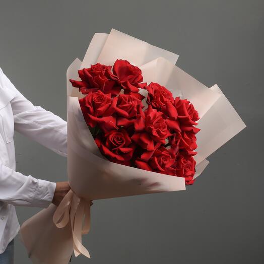 11 red Ecuador roses in design packaging