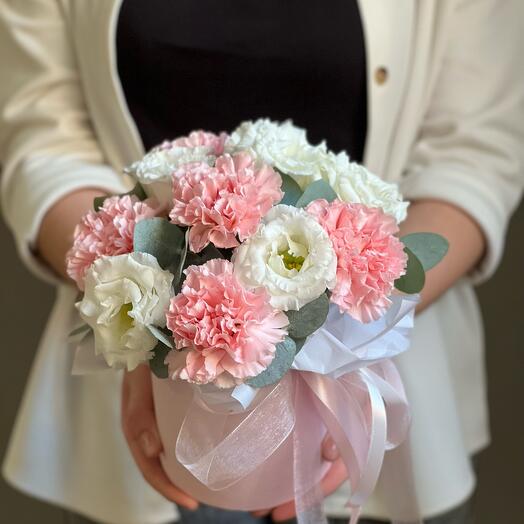 Flowers in the box delicate dianthus, eastoma, eucalyptus