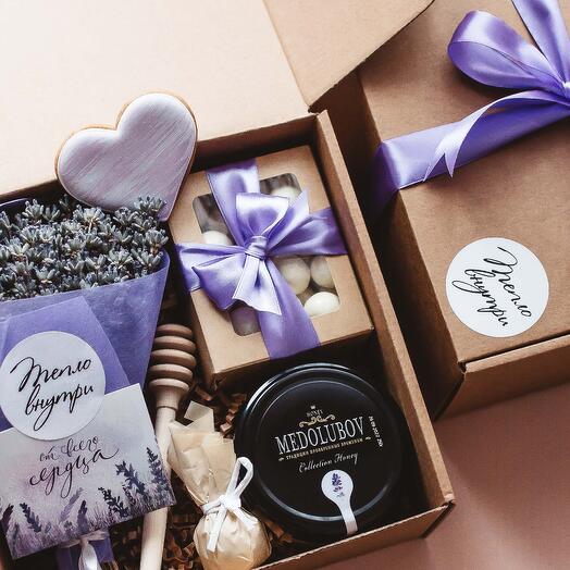 Gift set with a bouquet of dried flowers, honey and sweets, a birthday or anniversary