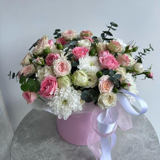 Flowers in the box (bush roses and chrysanthemum)