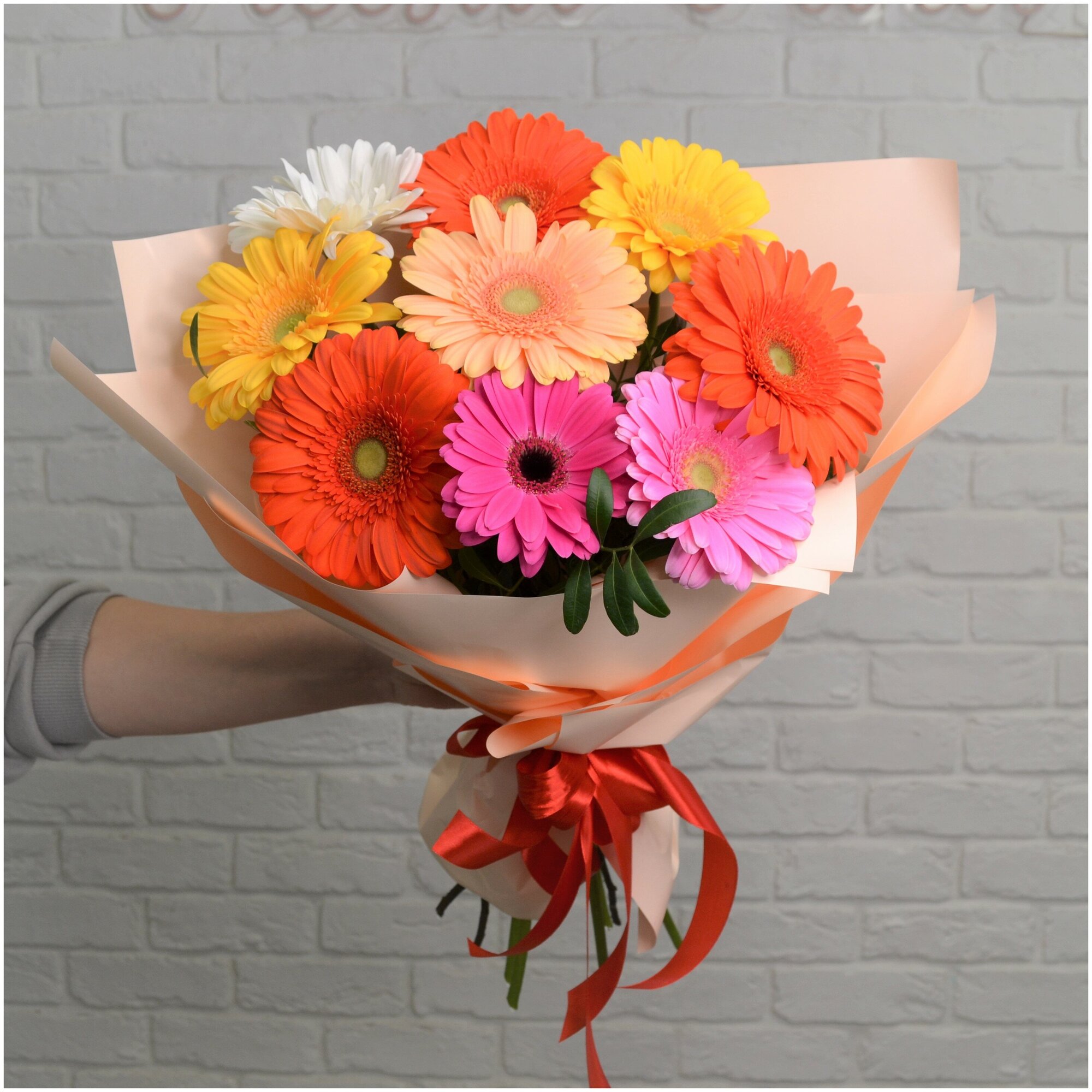 9 gerberas