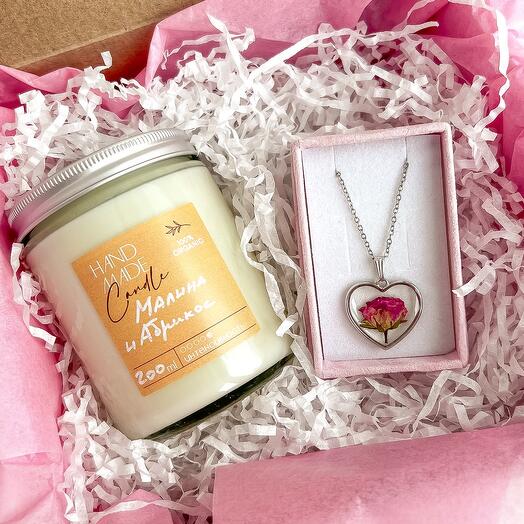 Birthday gift with a pendant and large candles