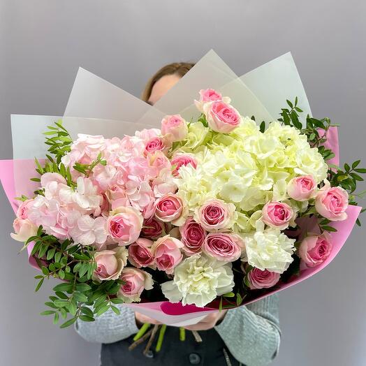 Bouquet of pink and white hydrangeas, bush roses and diantus