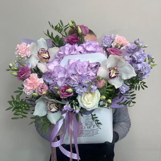 Flowers in a handbag with hydrangea and mattiola